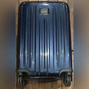 Tumi 22” Navy Blue International Expandable 4 Wheeled Carry-On